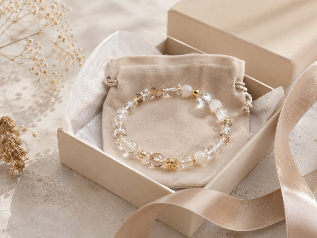 A delicate crystal bracelet presented on soft ivory fabric